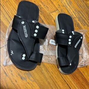 Black Sandals with White Accents